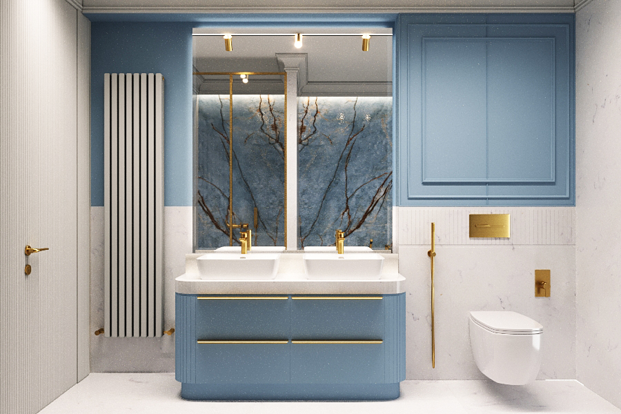 Nowoczesna łazienka z niebieskimi meblami, białymi kafelkami i złotymi akcentami. W centrum znajduje się podwójna umywalka z lustrem, obok grzejnik pionowy i wisząca toaleta.